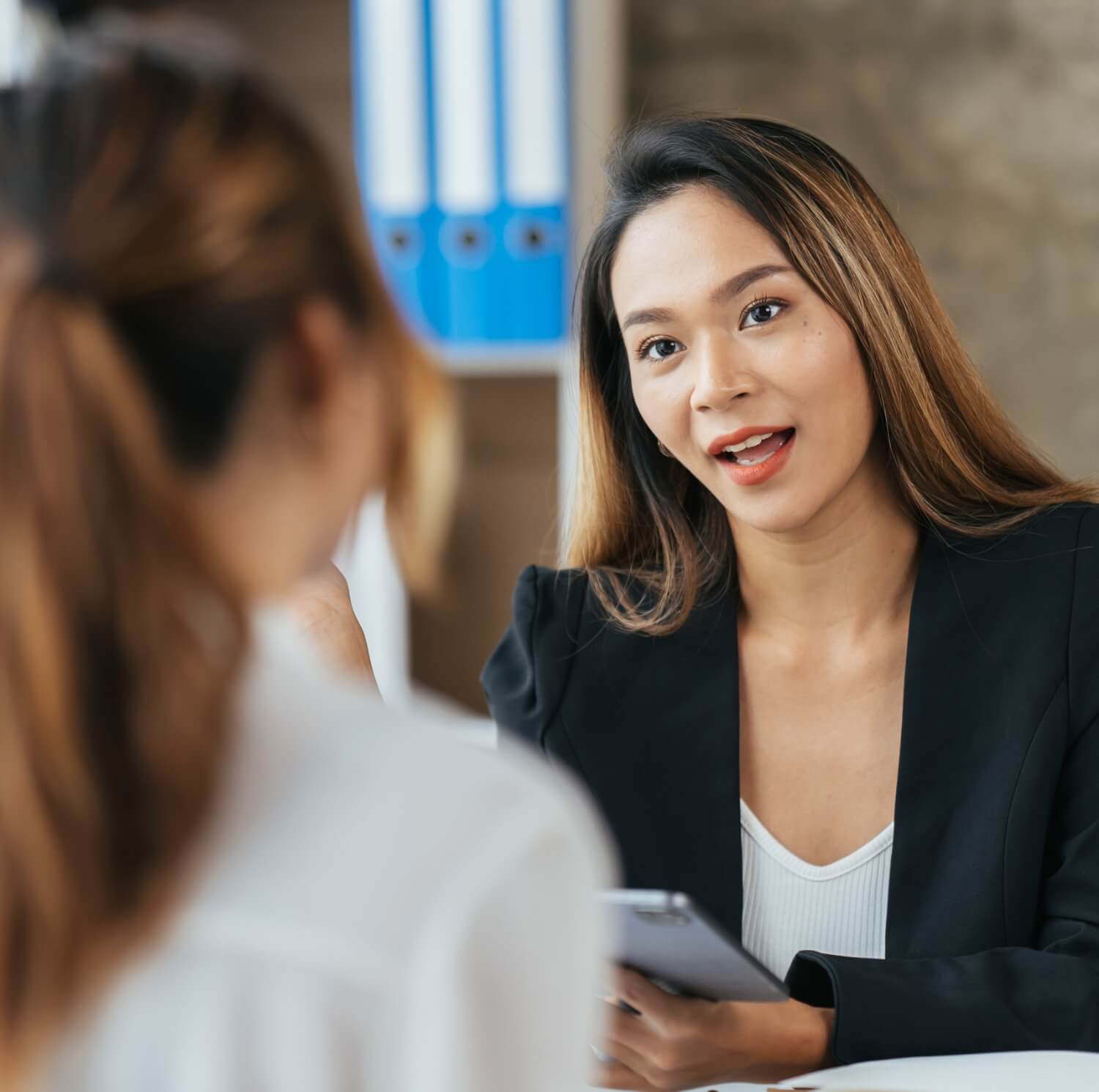 Women discussing business