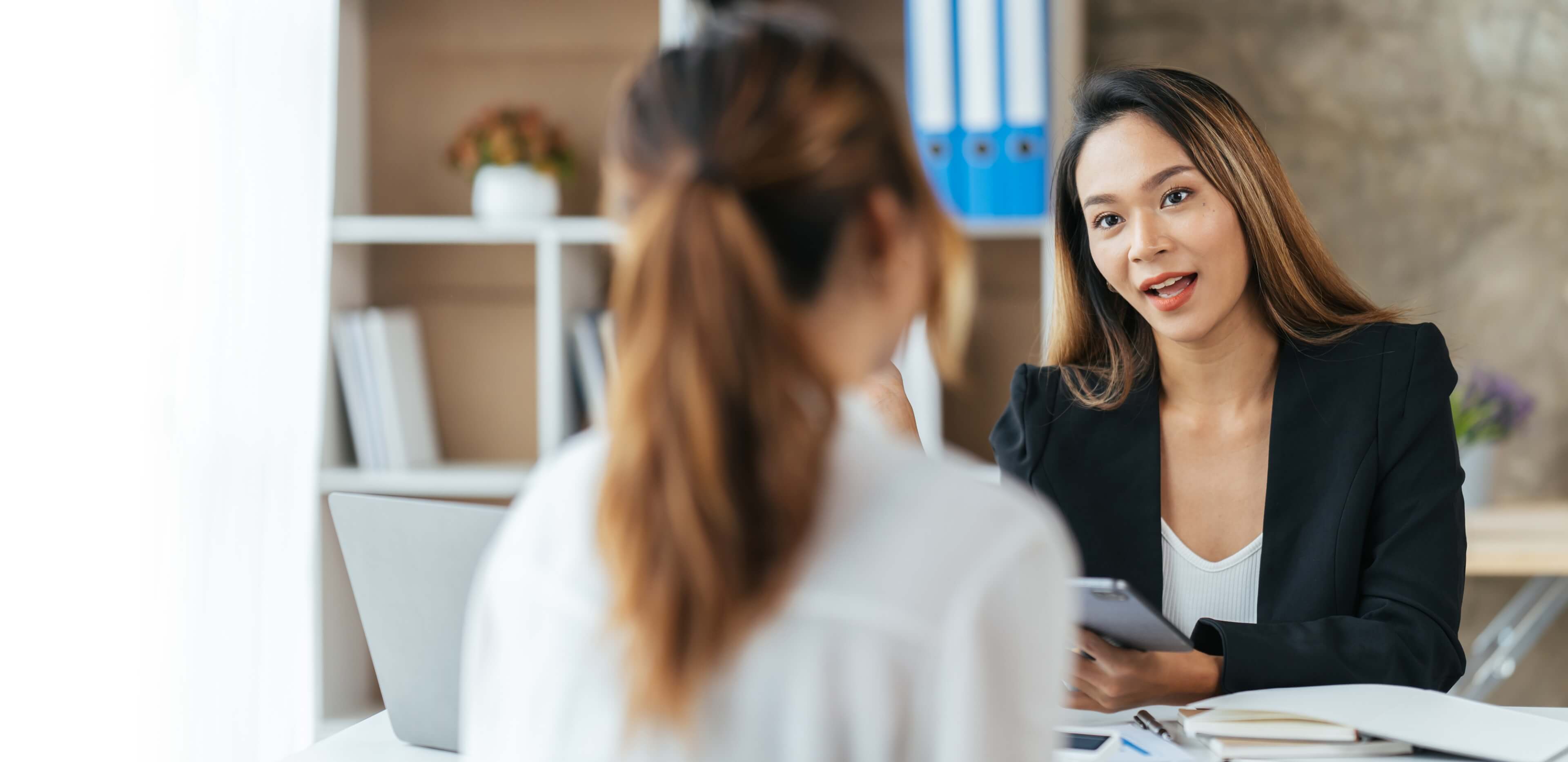 Women discussing business