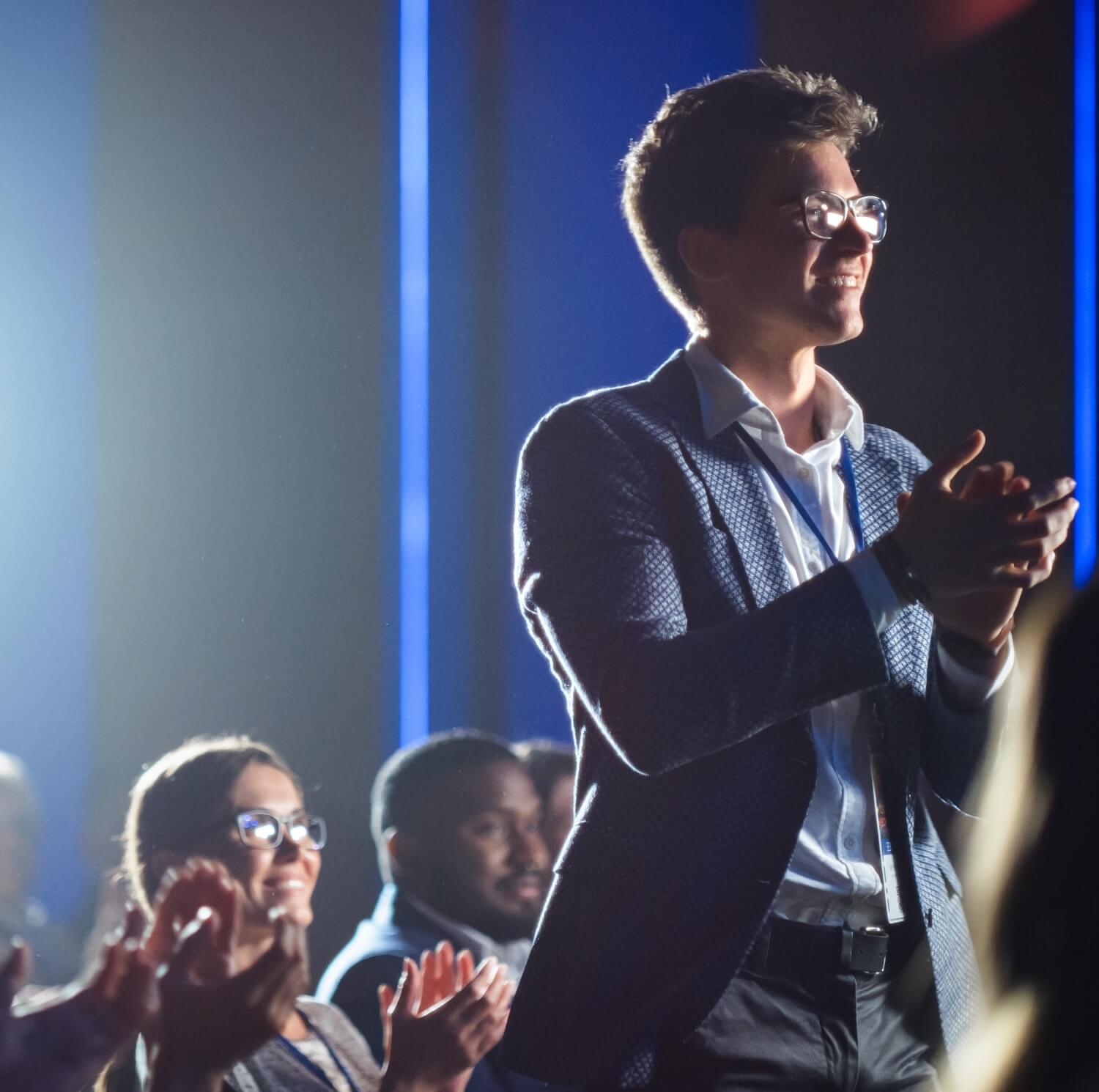 An audience clapping