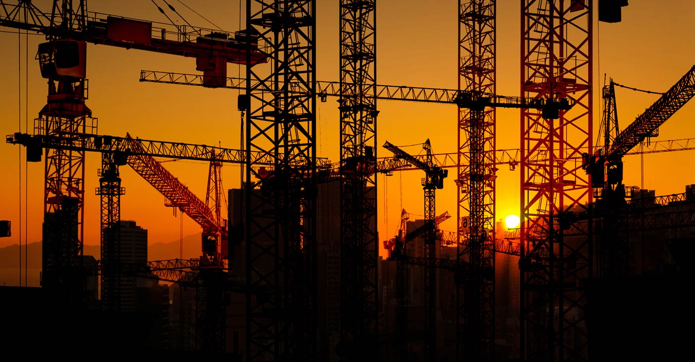 Silhouette of cranes on a Chinese construction site